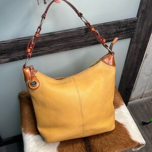 Dooney and Bourke yellow leather purse
